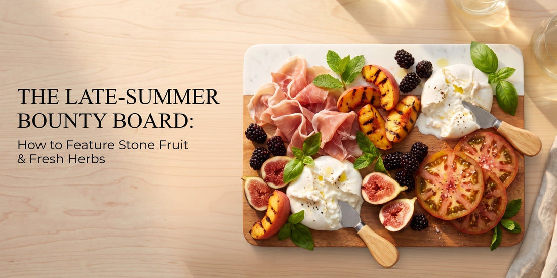Late-summer charcuterie board with prosciutto, grilled peaches, burrata, figs, and blackberries on a marble and wood board.